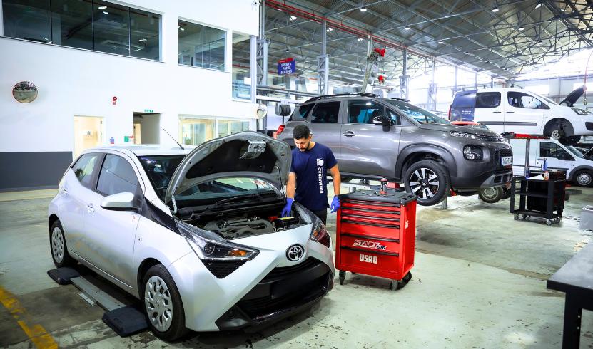 chnician servicing a commercial van with fast turnaround solutions in Malta.